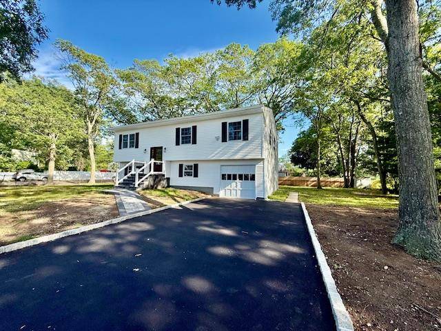 PRICE REDUCTION Prepare to be impressed by this stunning NEW Hi Ranch home, located on a quiet corner lot just minutes from the Ronkonkoma LIRR and the I 495 Expressway.