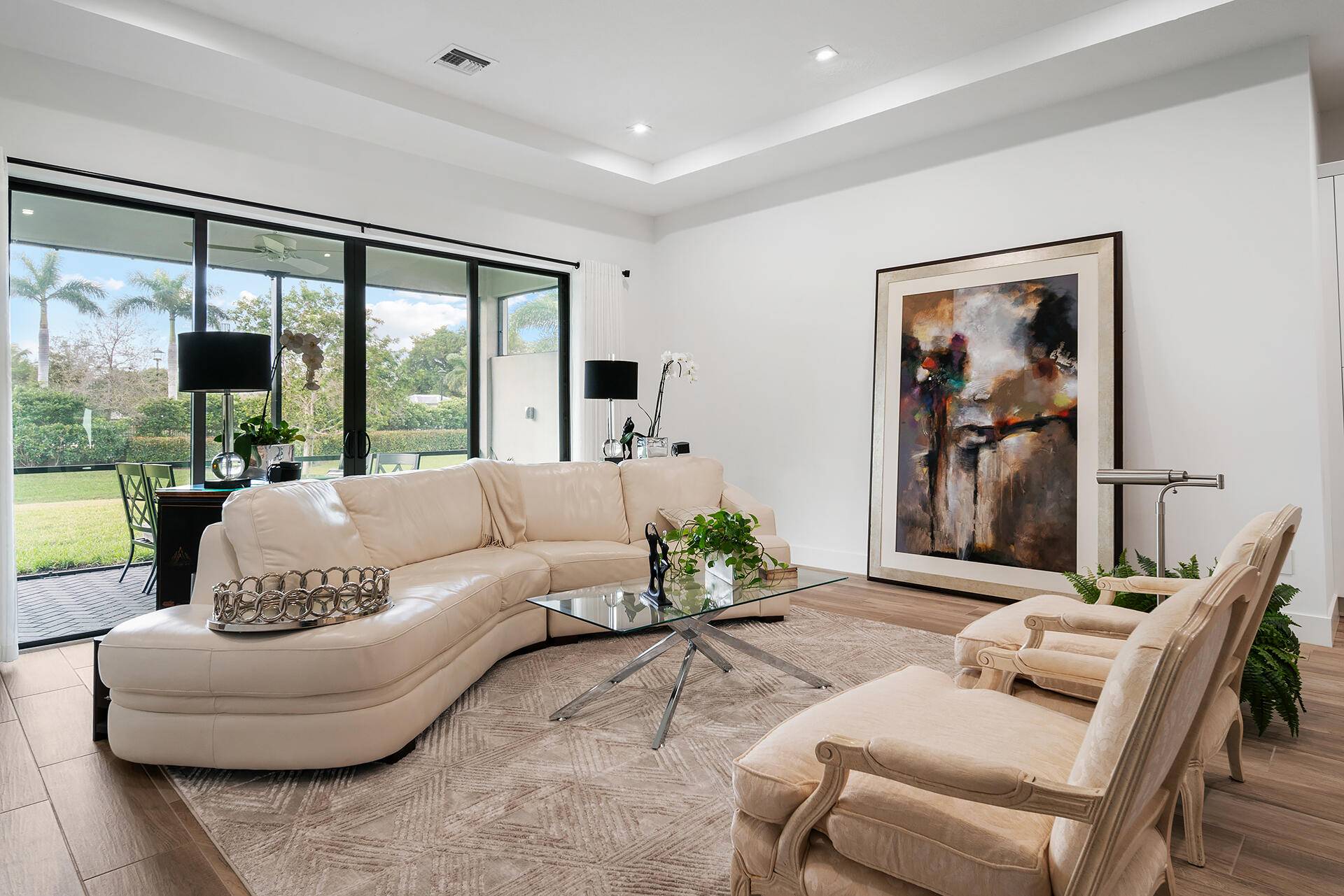This newly built, pristine chic, open concept 3 bedroom, 3 bath, 2 car garage residence is designed for casual luxe living.