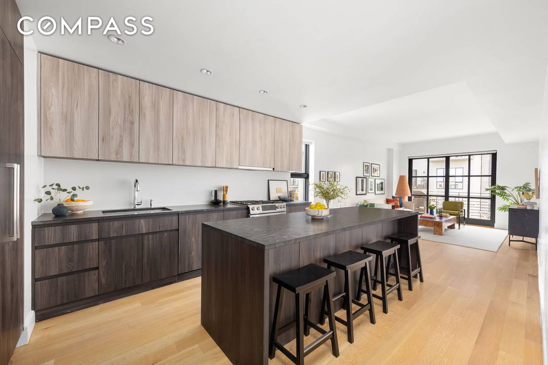 Residence 3C is a spacious, floor through two bedroom, two bath condo overlooking McCarren Park at the border of Greenpoint and Williamsburg.