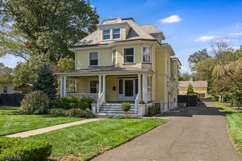 Stunning, fully updated four bedroom colonial blending every modern day amenity with the beautiful vintage charm of the original home.