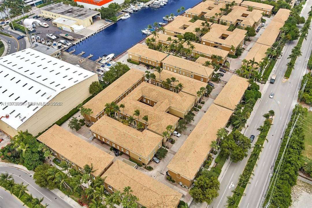 WATERFRONT CORNER UNIT WITH A BALCONY ONE OF A KIND IN COMMUNITY 3 STORY TOWNHOUSE 3 PARKING SPOTS, 2 CAR GARAGE, GREAT INVESTMENT WITH A TENANT INCLUDED, TENANT PAYING 3450, ...