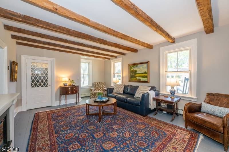 A rare piece of New Vernon history, this classic circa 1850 colonial seamlessly blends irreplaceable period charm with thoughtful modern updates.