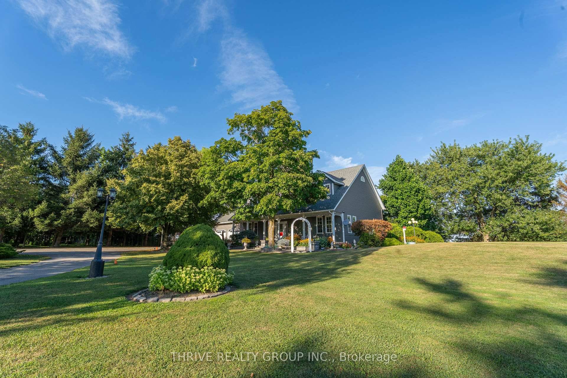 Stunning 4 bed, 3 bath Cape Cod style home sitting on a private 1 acre lot that offers convenience and tranquility !