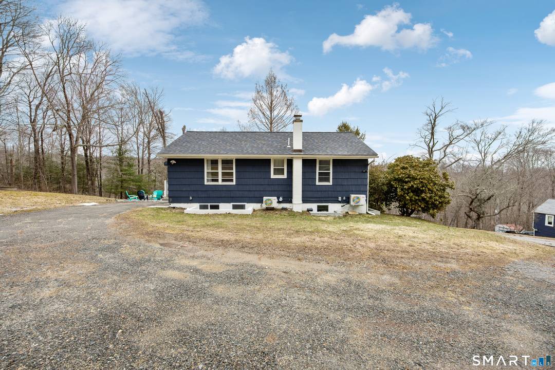 Welcome to 37 Church Hill Rd in Washington, a unique and versatile home set on a.