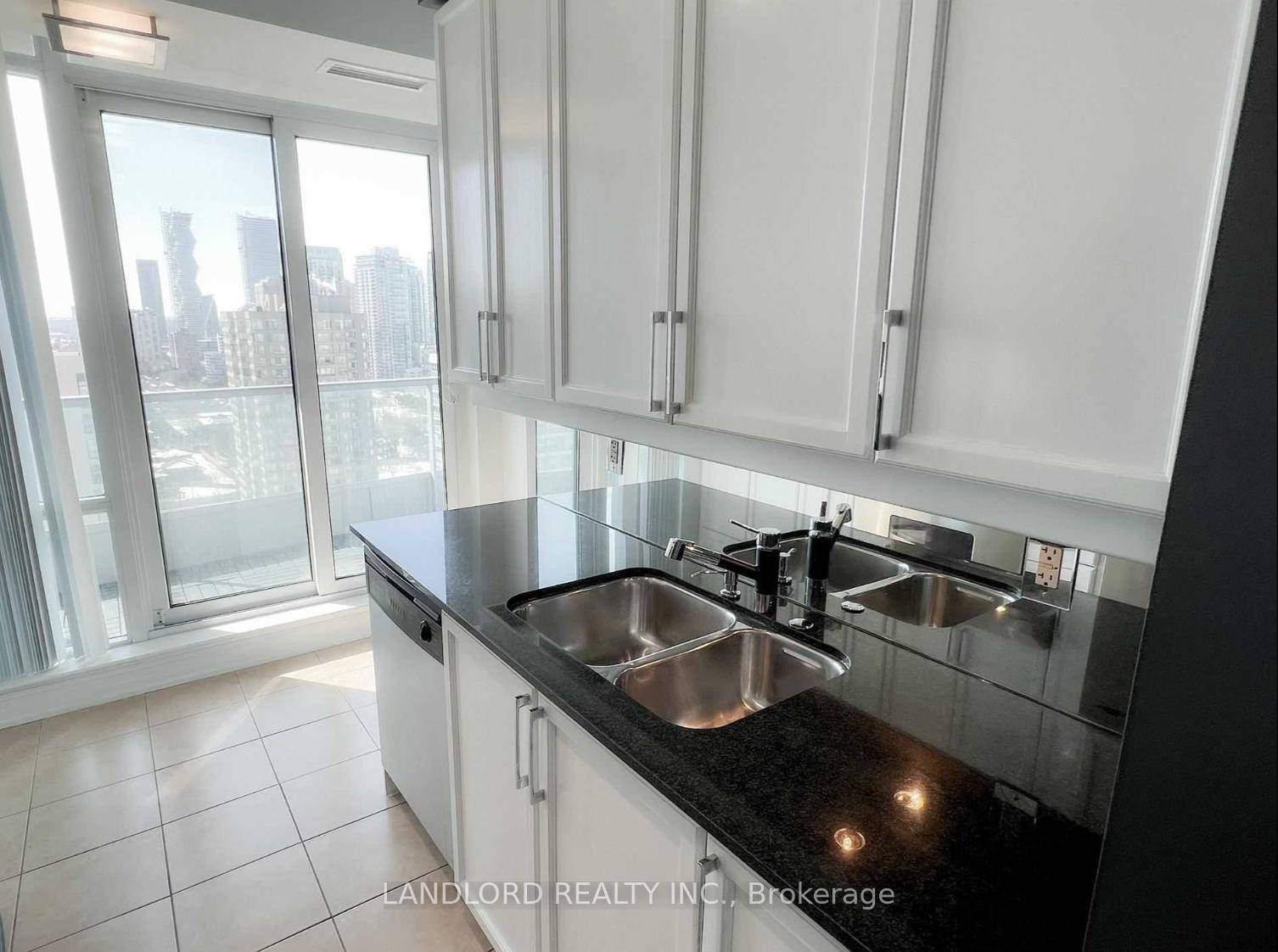 Stylish 2 Bed, 2 Bath Professionally Managed Condo Featuring A Galley Kitchen With Stone Countertops, Abundant Cabinetry, And Direct Access To The Balcony ; A Bright Open Living Room With ...
