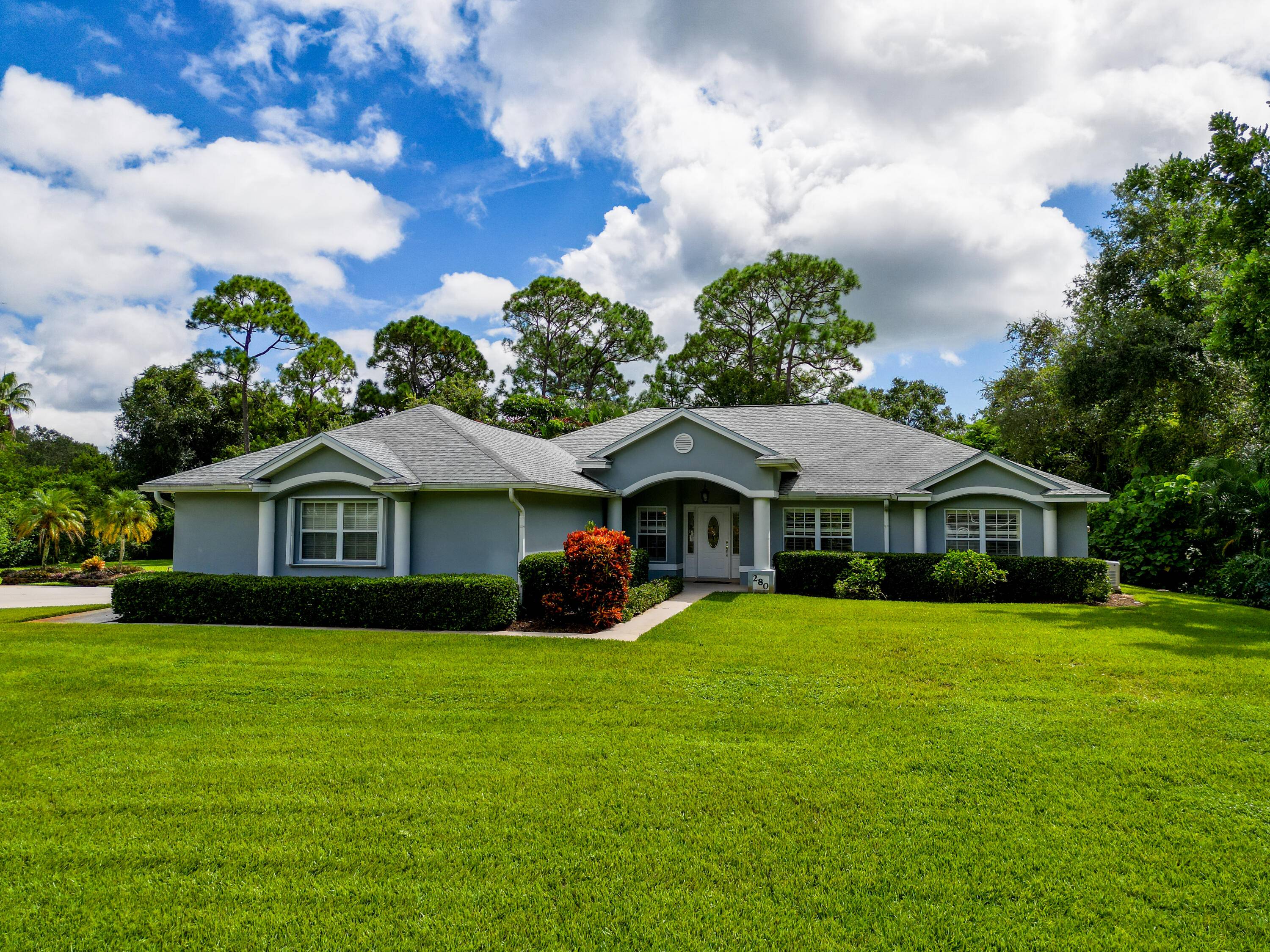 Welcome to 280 Nieuport Drive, a rare opportunity in Indian River Aerodrome Vero Beach's exclusive fly in community.
