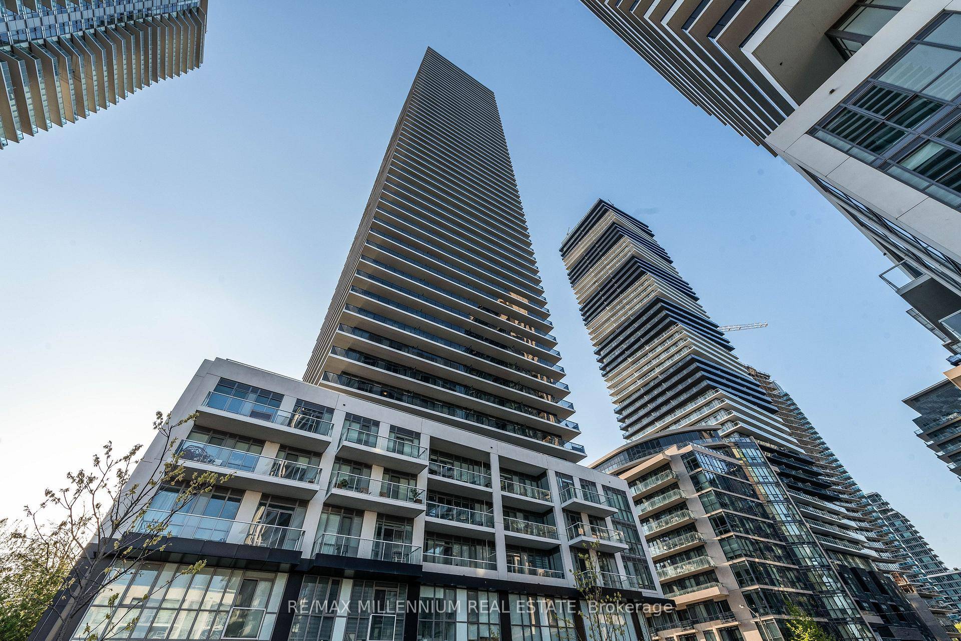 Welcome to Vita Two Condominiums at 70 Annie Craig Drive where modern design meets lakeside living.