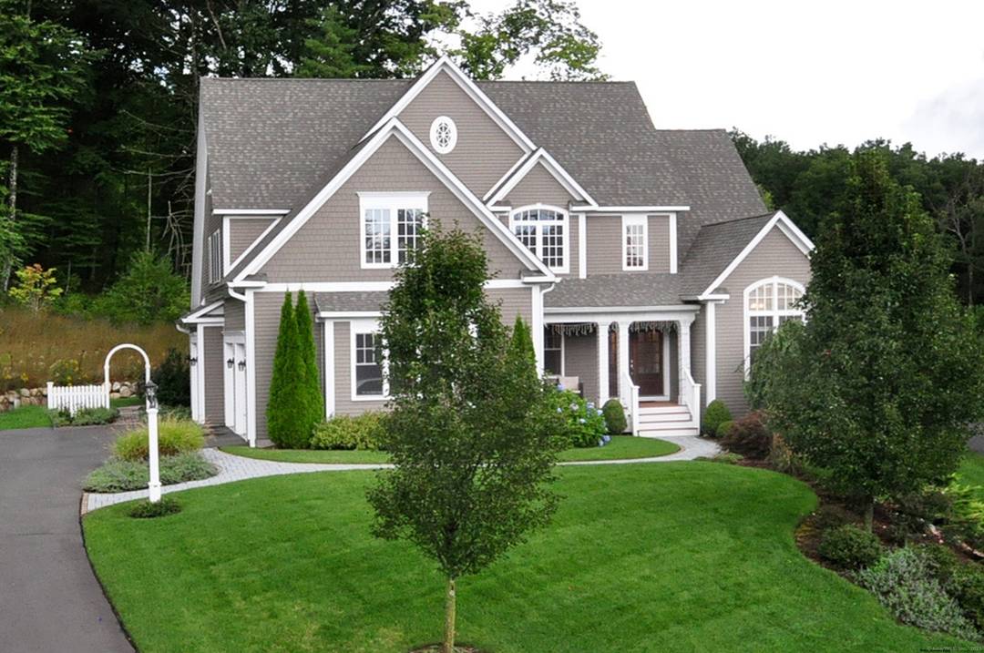 A 9 year young home in Bridgehampton Crossing located in the Unionville area of Farmington.