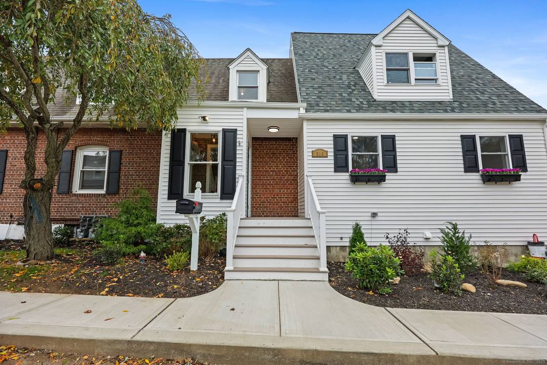 Lordship Newly expanded 1 2 duplex townhouse featuring covered front porch, entry hall, Living room with HW floors, Dining room with HW floor and recessed lights, Newer Kitchen with white ...