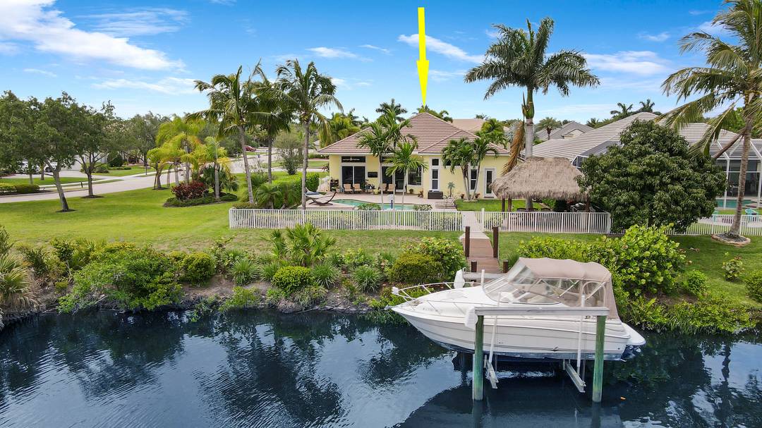 Come see this impressive waterfront pool home located in a gated boating community.