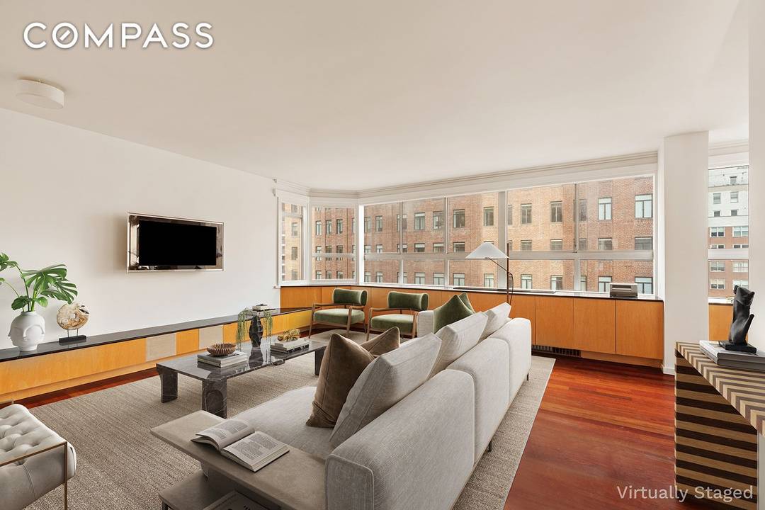 Discover an exceptional level of privacy and sophistication in this distinctive condominium home, perfectly positioned just off Park Avenue in the heart of Lenox Hill.