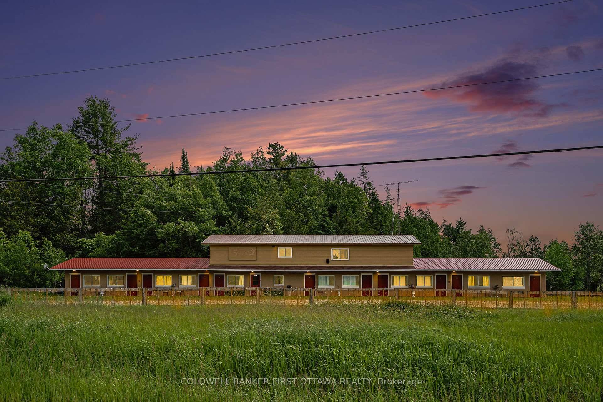 Thriving Business Opportunity in the Heart of Cottage Country next to Palmerston Lake.