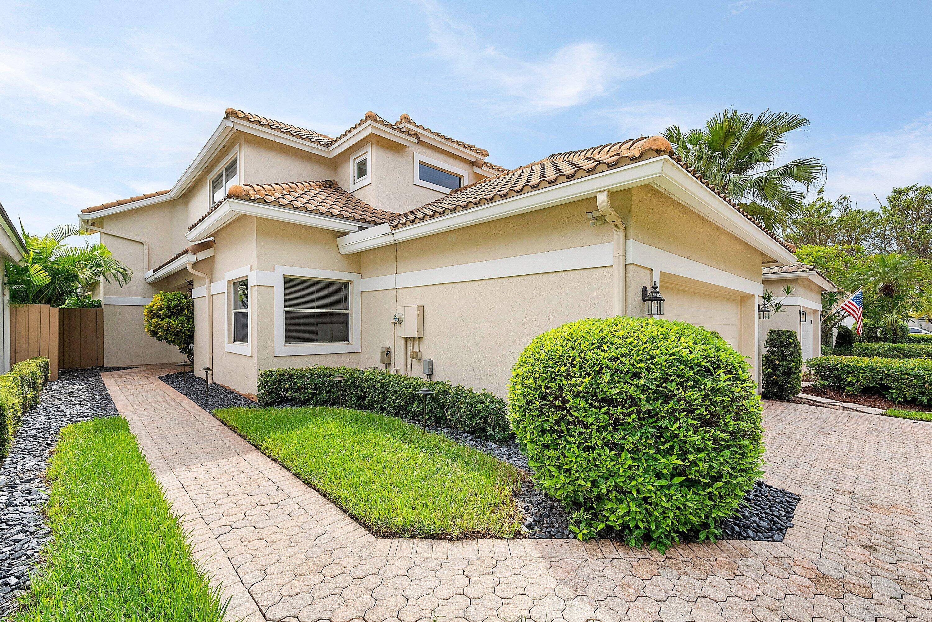 Live the ultimate country club lifestyle in this renovated 3 bed, 2 bath home on a quiet cul de sac in Boca Raton's prestigious Broken Sound Country Club.
