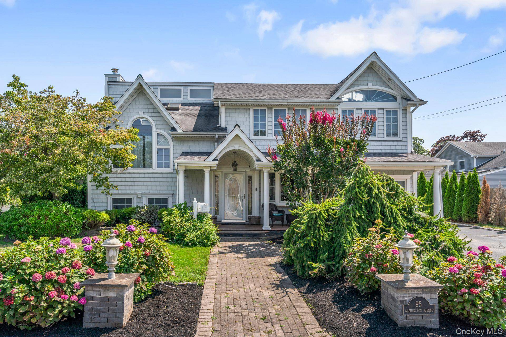 Welcome to 95 Washington Avenue, Islip Terrace a stunning split level home completely remodeled in 2009, designed for comfort, style, and entertaining.
