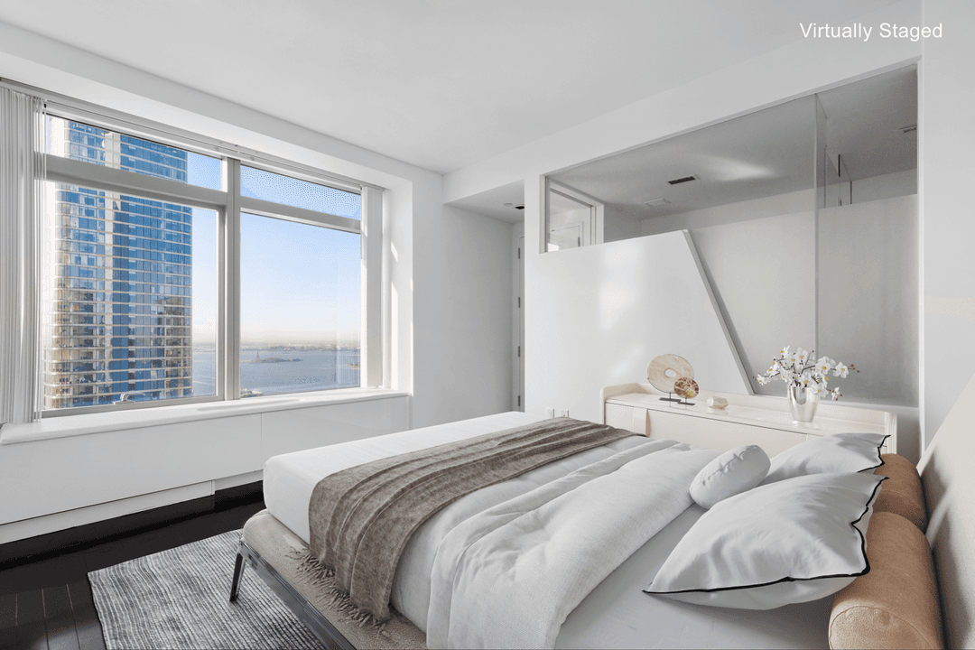 PRICED TO SELL A one bedroom offering south exposures and breathtaking views of the Hudson River, downtown Manhattan, and the Statue of Liberty from every room.