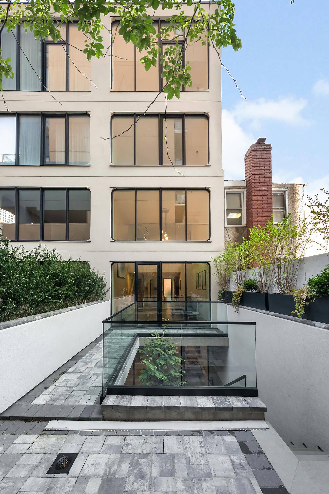 This is a building with a unique and striking personality This townhouse design is truly special, standing out from the typical homes that populate many neighborhoods.