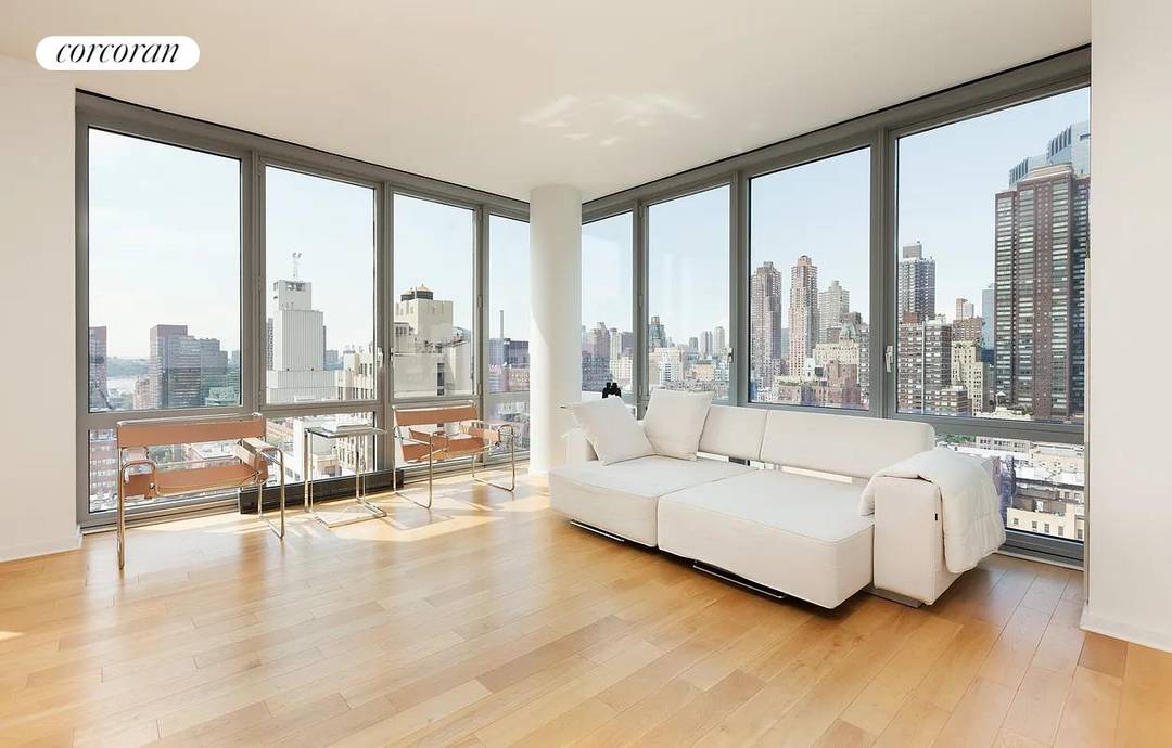 Sophisticated High Floor Residence with Spectacular Views This exceptional split two bedroom, two full bath plus powder room residence is positioned on a high floor within one of Midtown West's ...