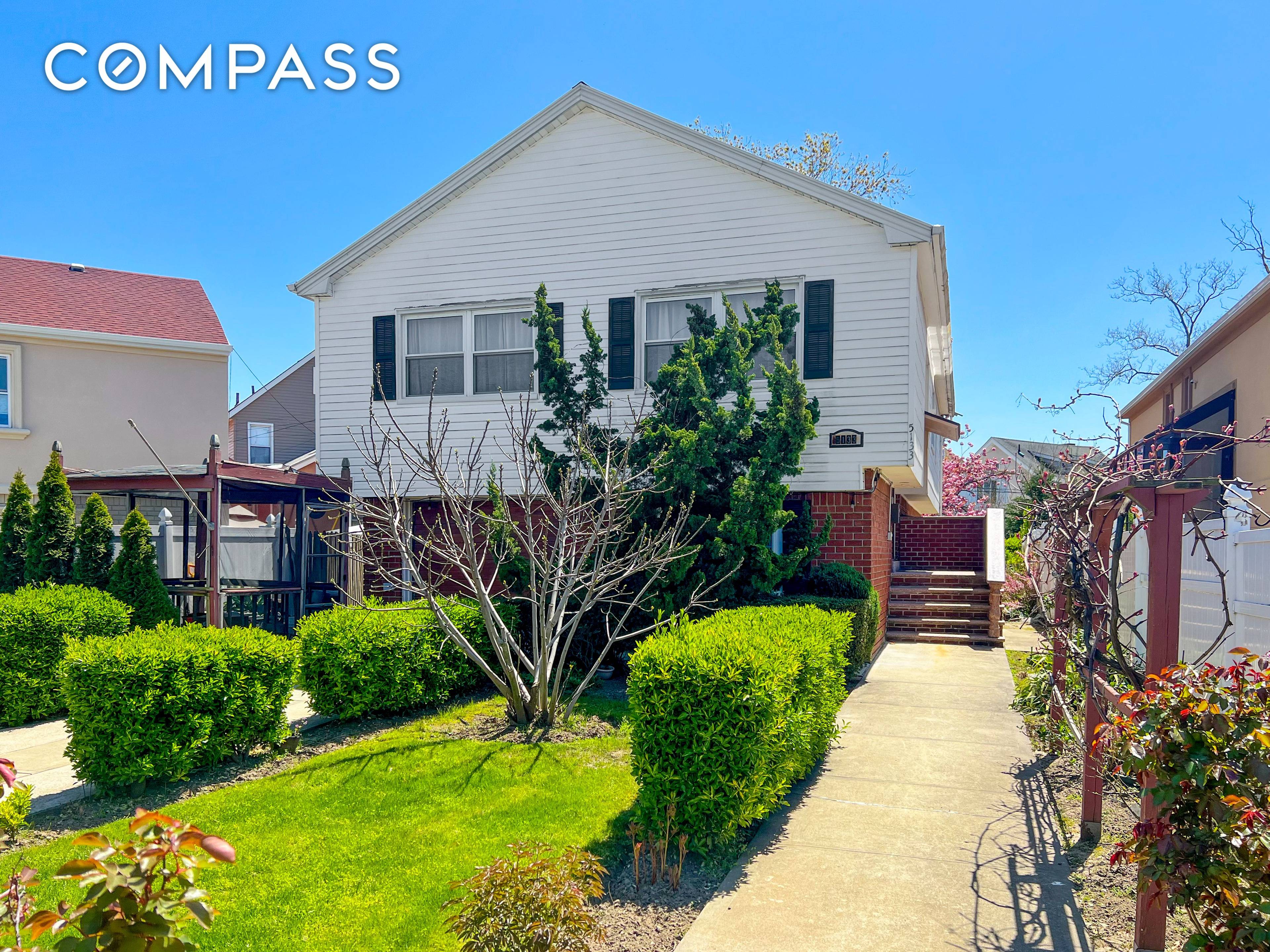 Welcome to this high ranch single family home in the private, gated community of Seagate.