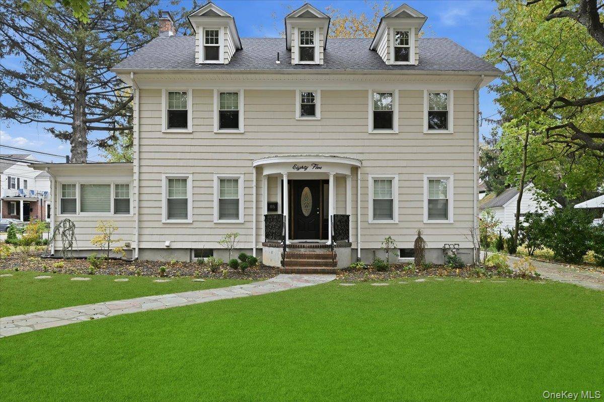 Completely renovated Colonial offering the perfect blend of classic charm and modern comfort !