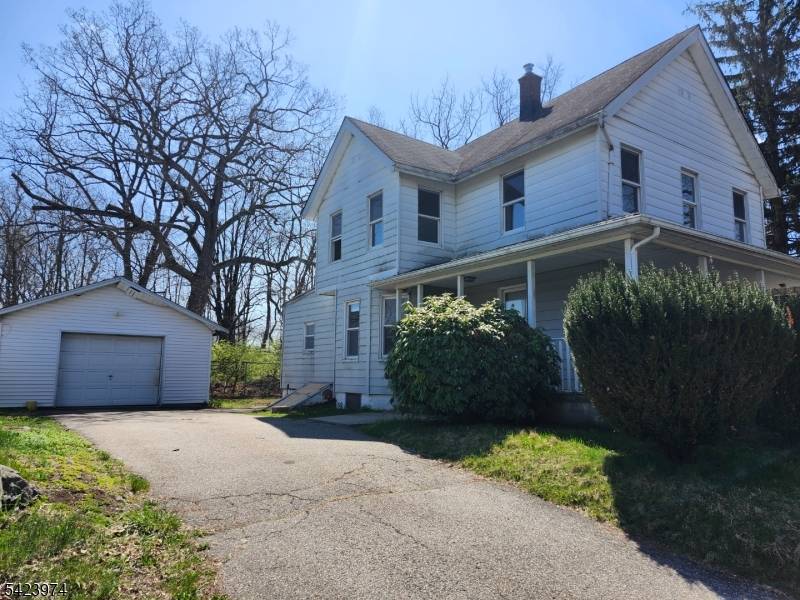 This property in Haskell offers endless potential as a non conforming two family home situated on a flat, oversized lot of approximately 190x80.