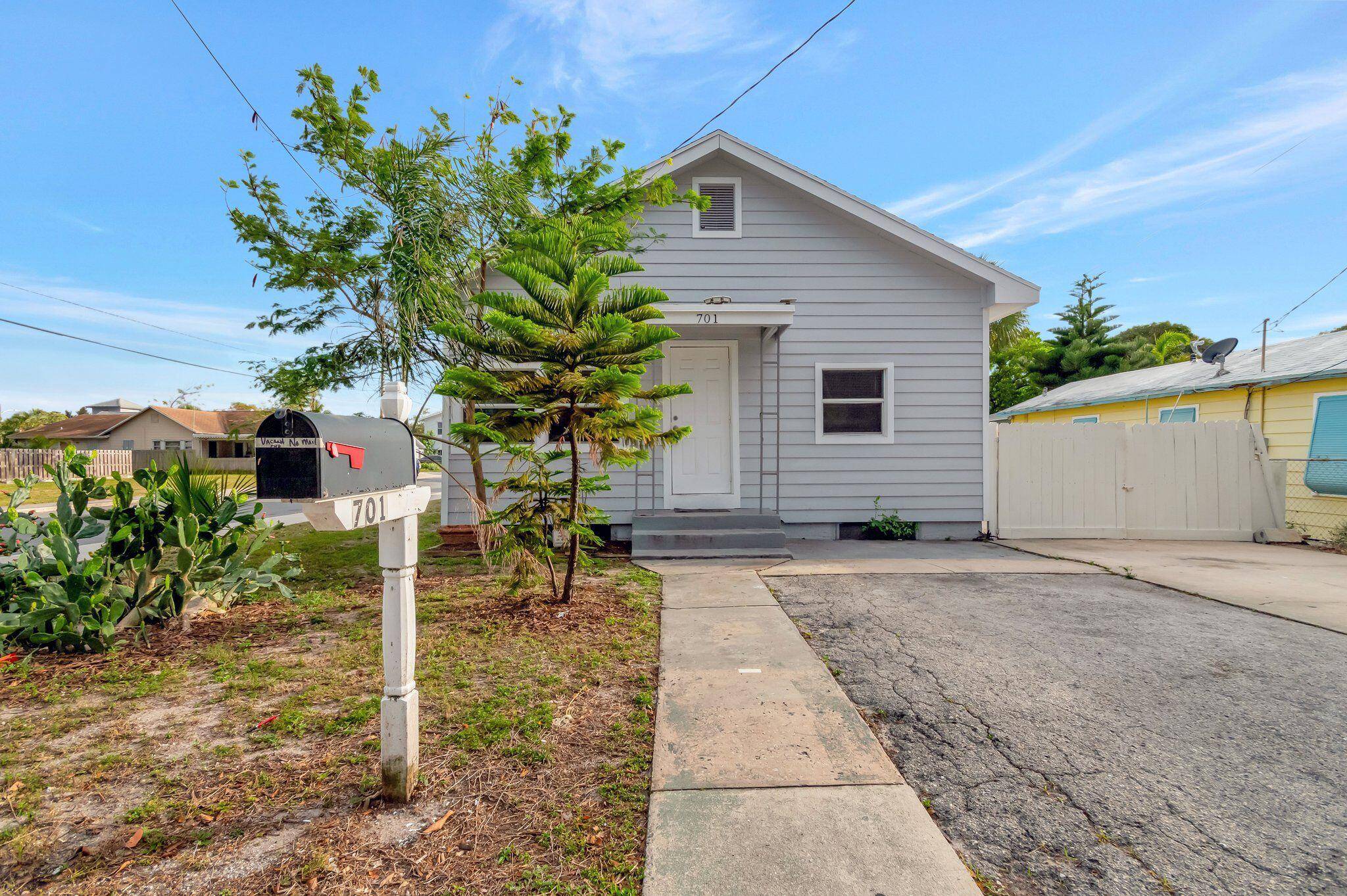 BRAND NEW ROOF 2024 ! Welcome to 701 Washington Avenue, a delightful 4 bedroom, 2 bathroom, single story home nestled on a desirable corner lot in Lake Worth.