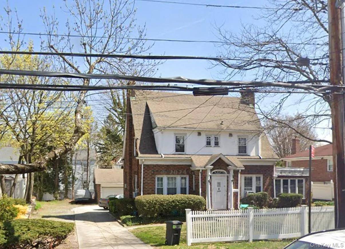 OPPORTUNITY KNOCKS ! Double Brick One Family 2, 500 SF Home With Great Bones.