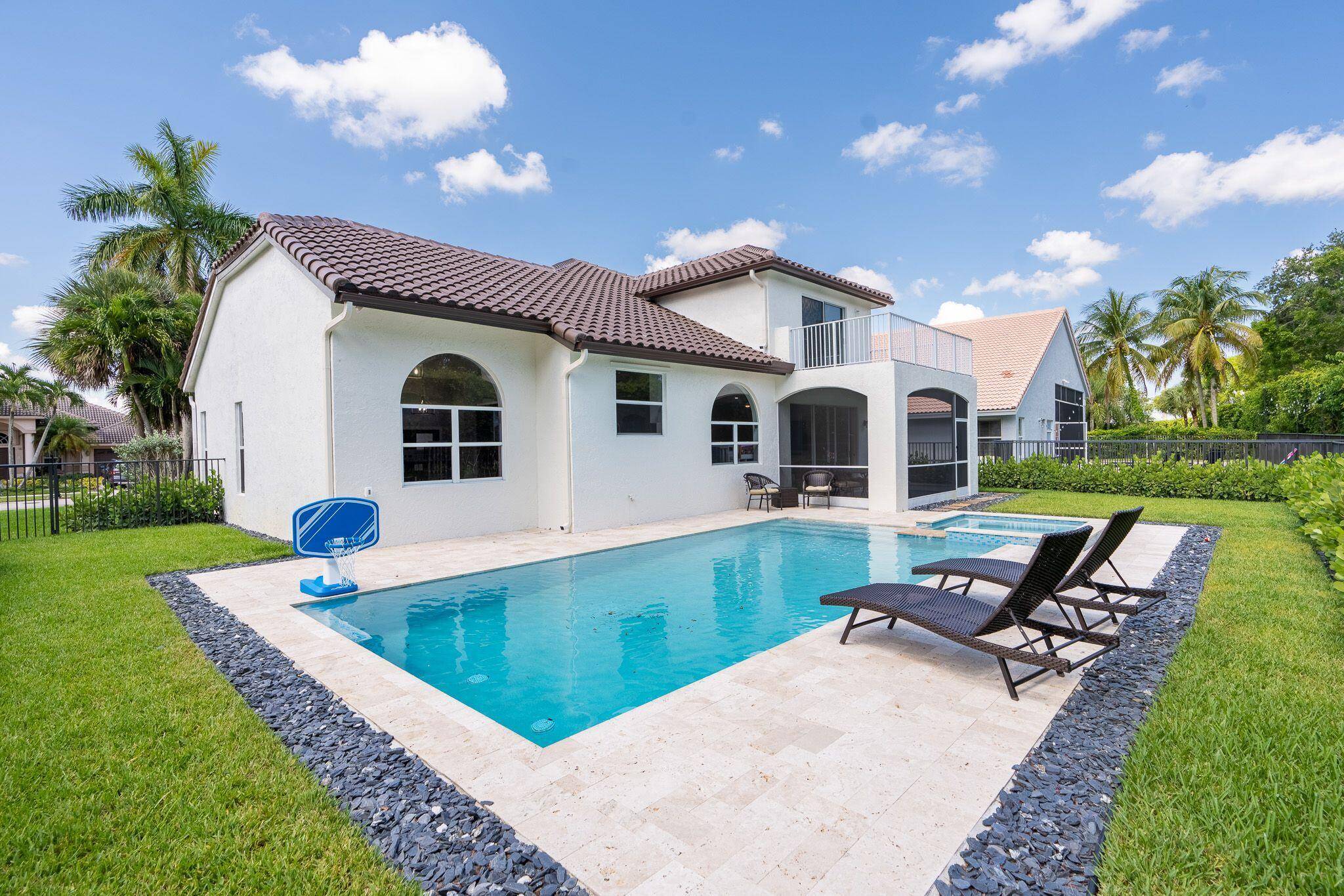 Newly renovated modern home in highly desirable Boca Isles South with 3 car garage.