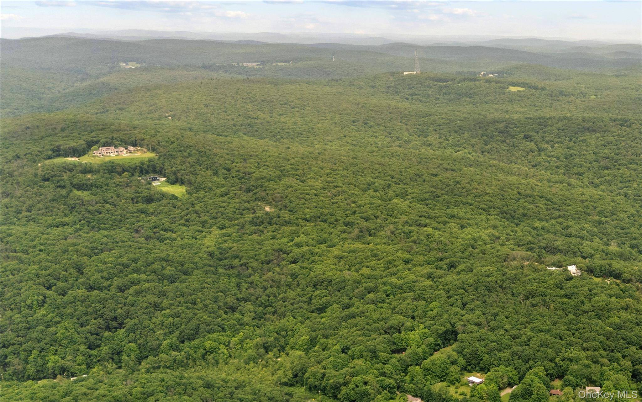 65 acres of rolling terrain offers endless possibilities in Cold Spring, NY.