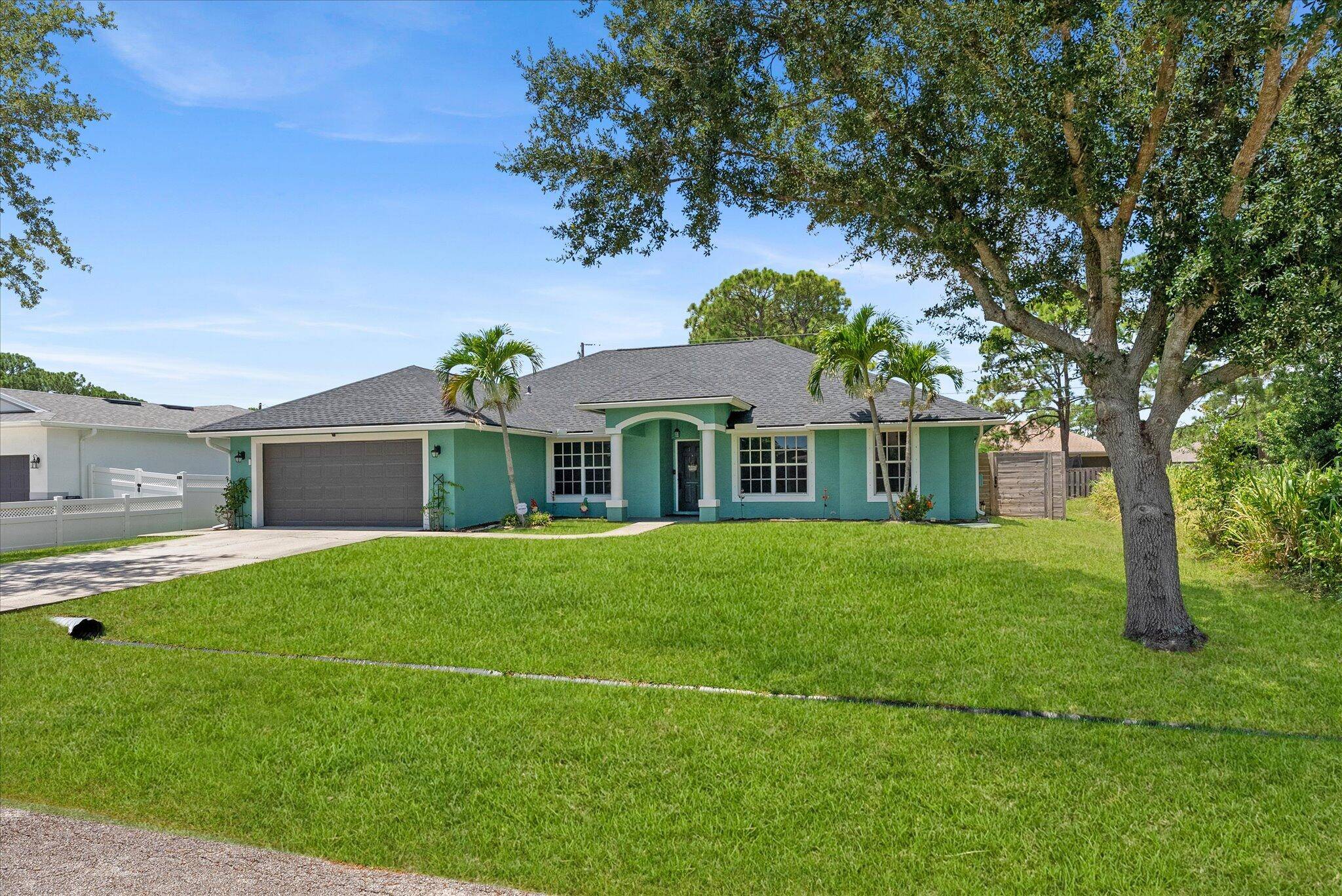 STUNNING ! Remodeled Pool Home New Roof, A C Water Heater No HOA Bright Open Floor Plan Split Bedroom Vaulted Ceilings LED High Hat Lighting Crown Molding Formal Dining Room ...