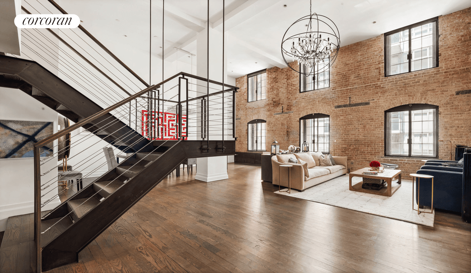 Stunning duplex loft in the coveted Sugar Warehouse Condominium.
