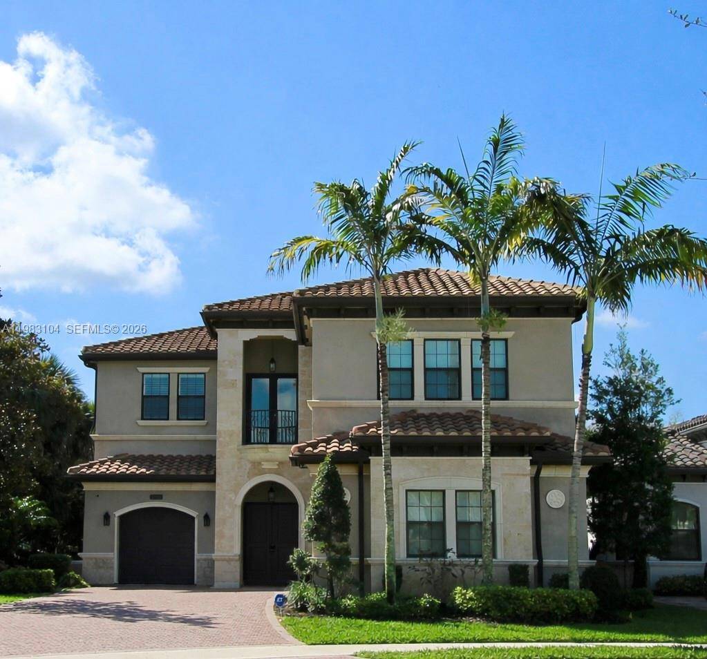 Luxury, privacy, and resort style living await in this beautifully appointed Vizcaya model in the prestigious Seven Bridges community.