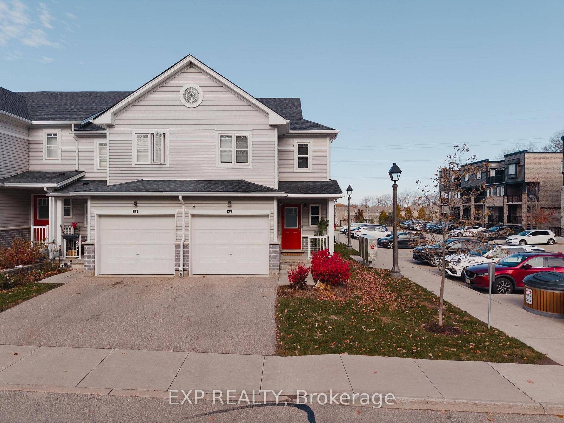 Welcome to 47 1989 Ottawa Street South, a bright and inviting end unit townhome tucked within a peaceful community in Kitchener's south end.