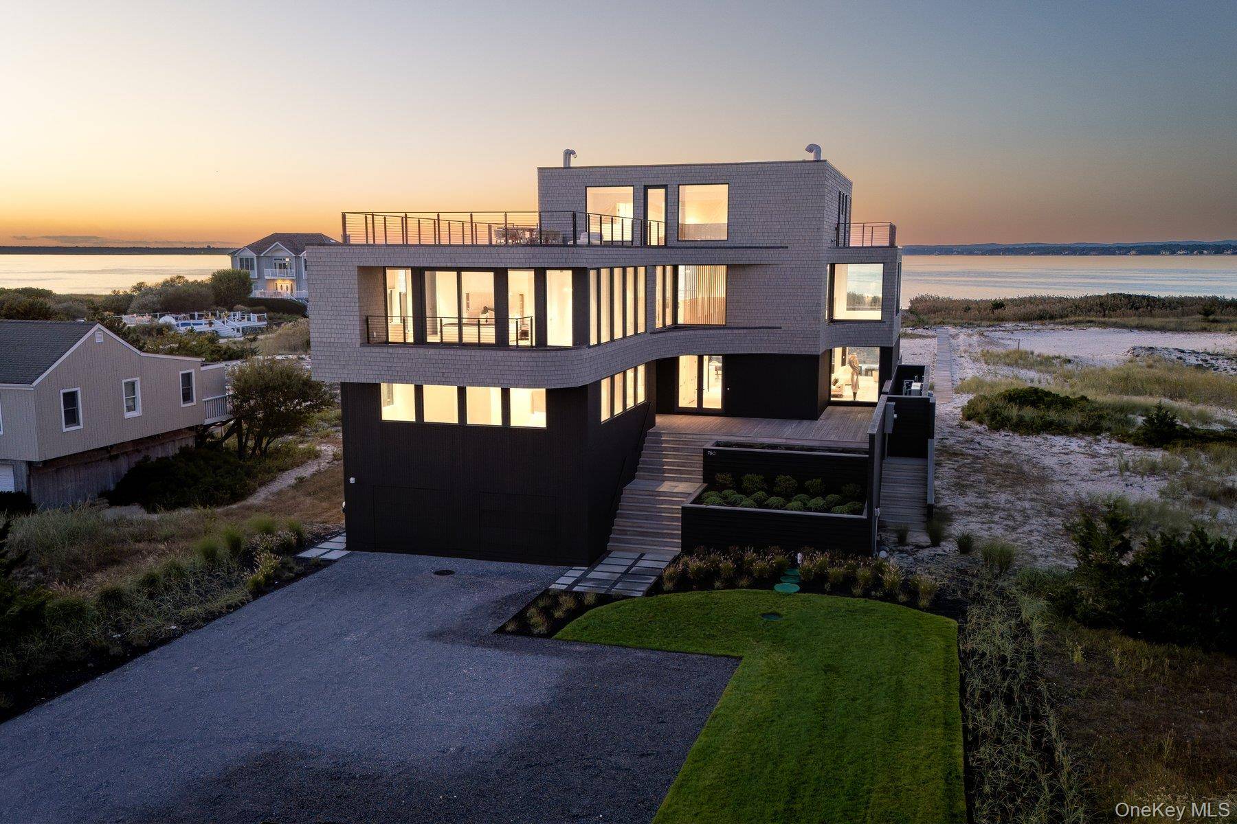 Welcome to Curving Dunes, a stunning Hamptons retreat built to perfection and expertly designed by First Dunes in collaboration with The Up Studio.