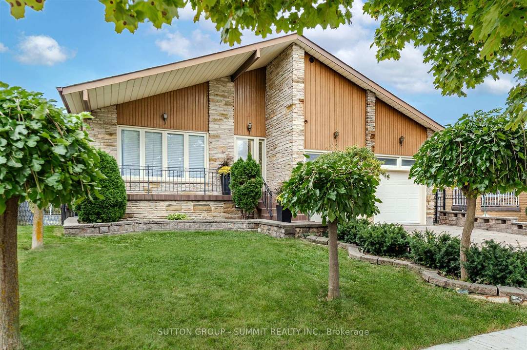 Nestled on a quiet street and perfectly perched backing onto a lush amp ; mature Ravine.