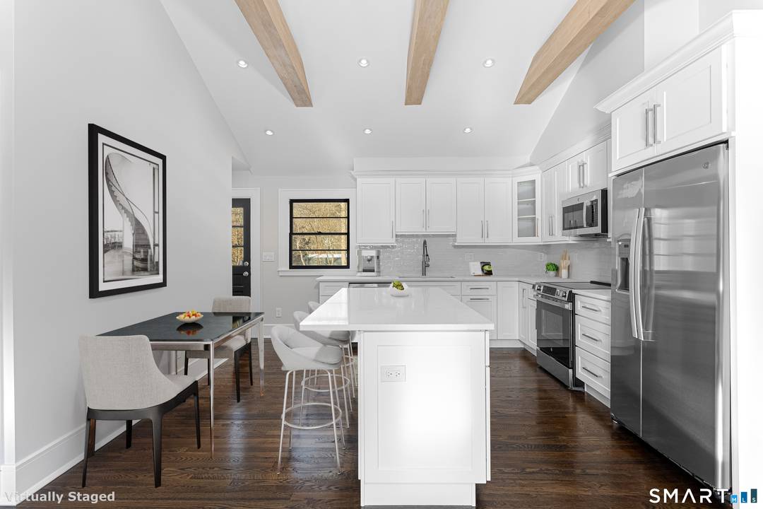 Completely reimagined from the studs up, this fully renovated 5 bedroom, 4.