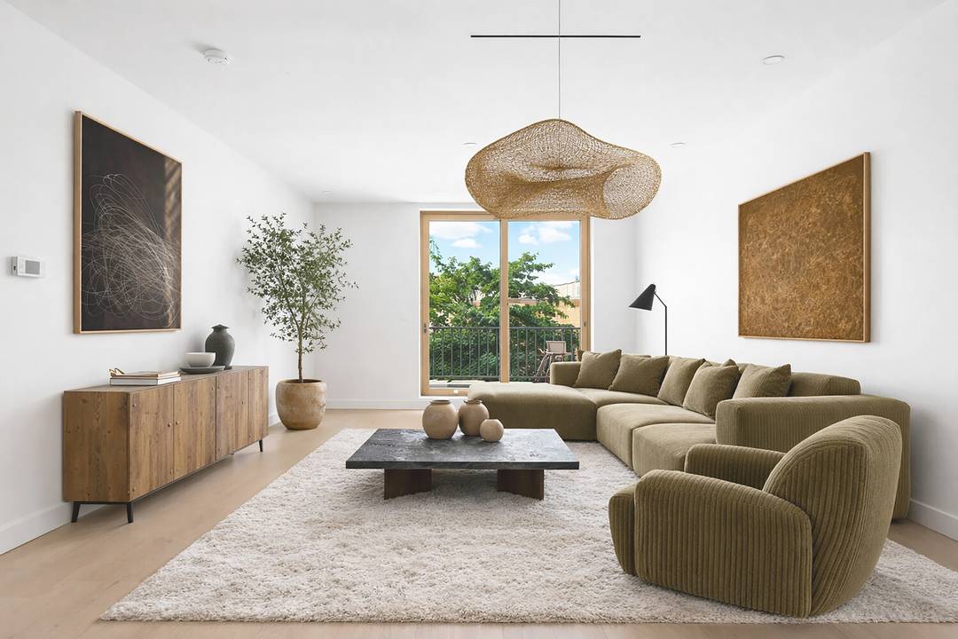 Crowning 19 North Henry Street, a floor through penthouse duplex offering a rare level of privacy, scale, and indoor outdoor lifestyle.