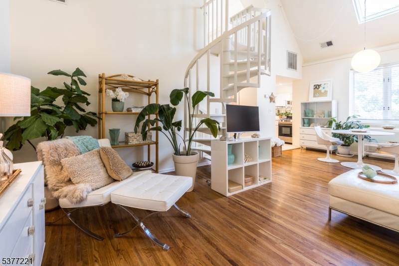 Step into this one of a kind private, New York City inspired condo, perfectly situated in the heart of downtown Denville.