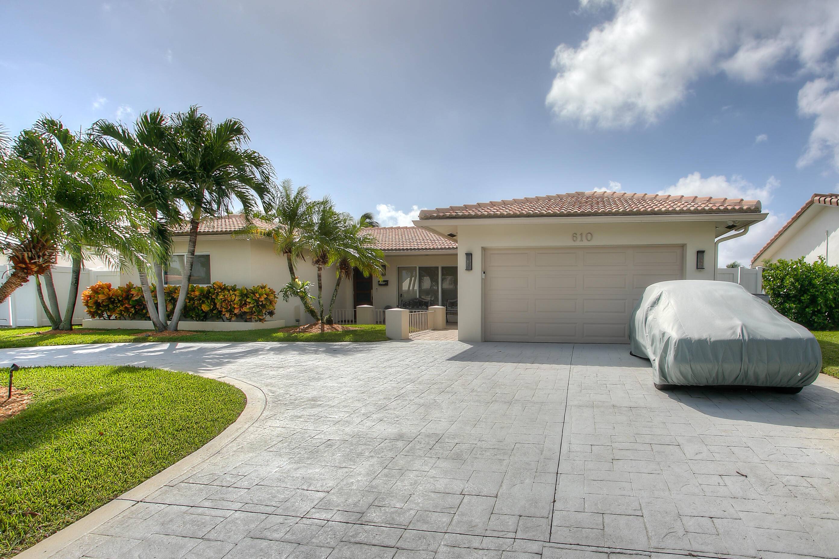 Welcome to this stunning 4 bedroom, 3 bath oasis with resort style amenities in the heart of East Pompano !