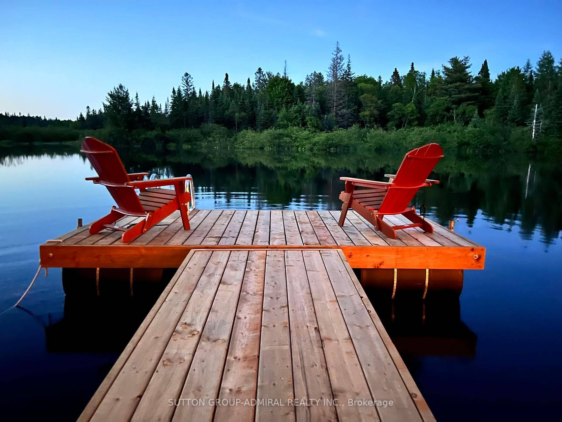 AFFORDABLE Muskoka River Direct WATERFRONT oasis with 100 Ft of shoreline.