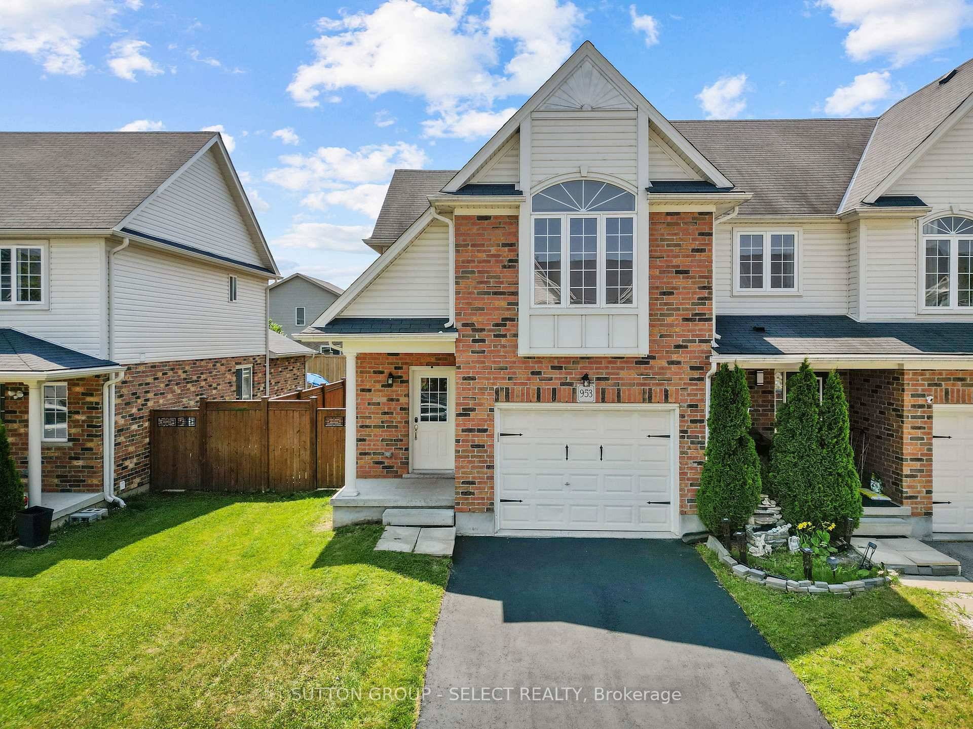Welcome to 953 Silverfox Crescent an end unit townhome in North London's sought after Fox Field community.