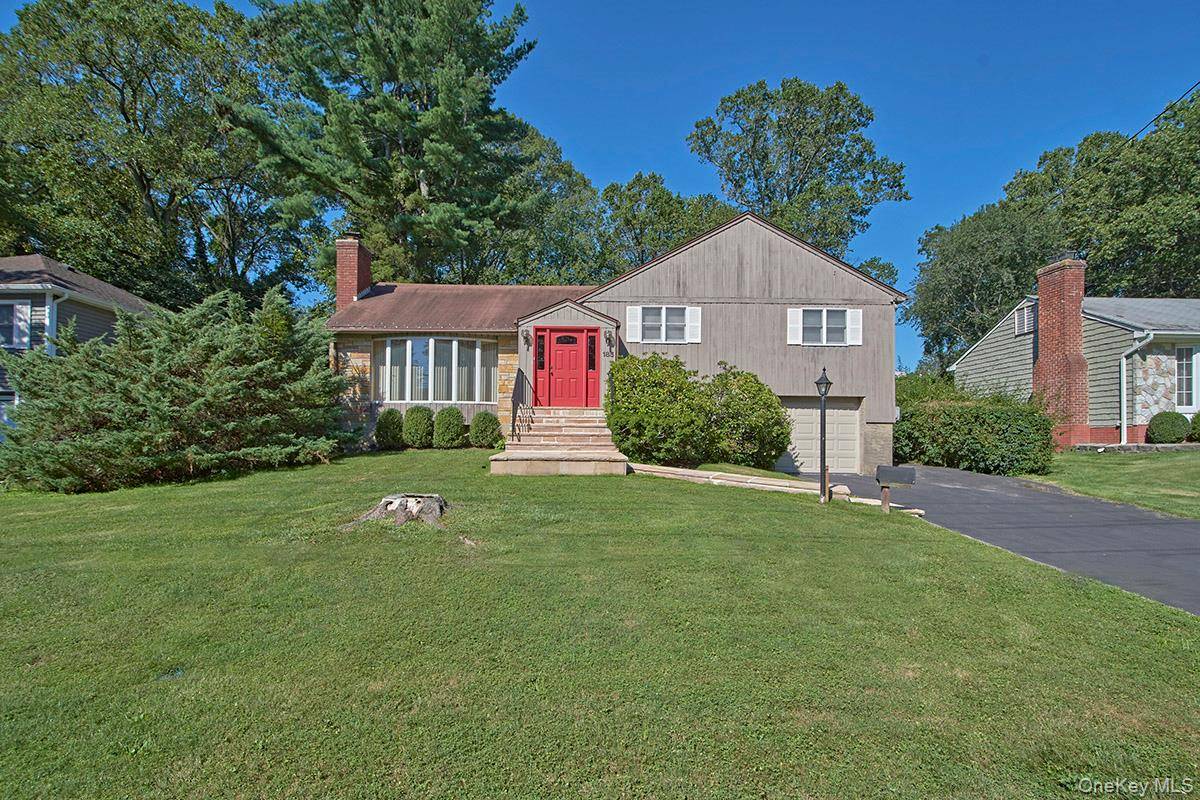 Easy Flow In This 3 Bedroom 3 Bath Split Level Home !