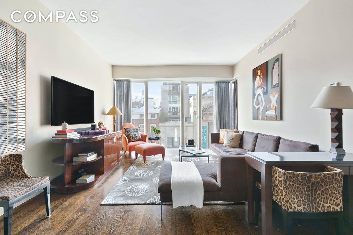 This designer constructed apartment with custom built ins and furniture is a 1, 289 square foot luxury one bedroom with two full baths, unlike any other unit in the building.