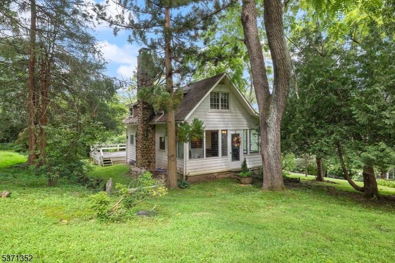 Charming home with three levels of living space, just waiting for your personal touch and updates !