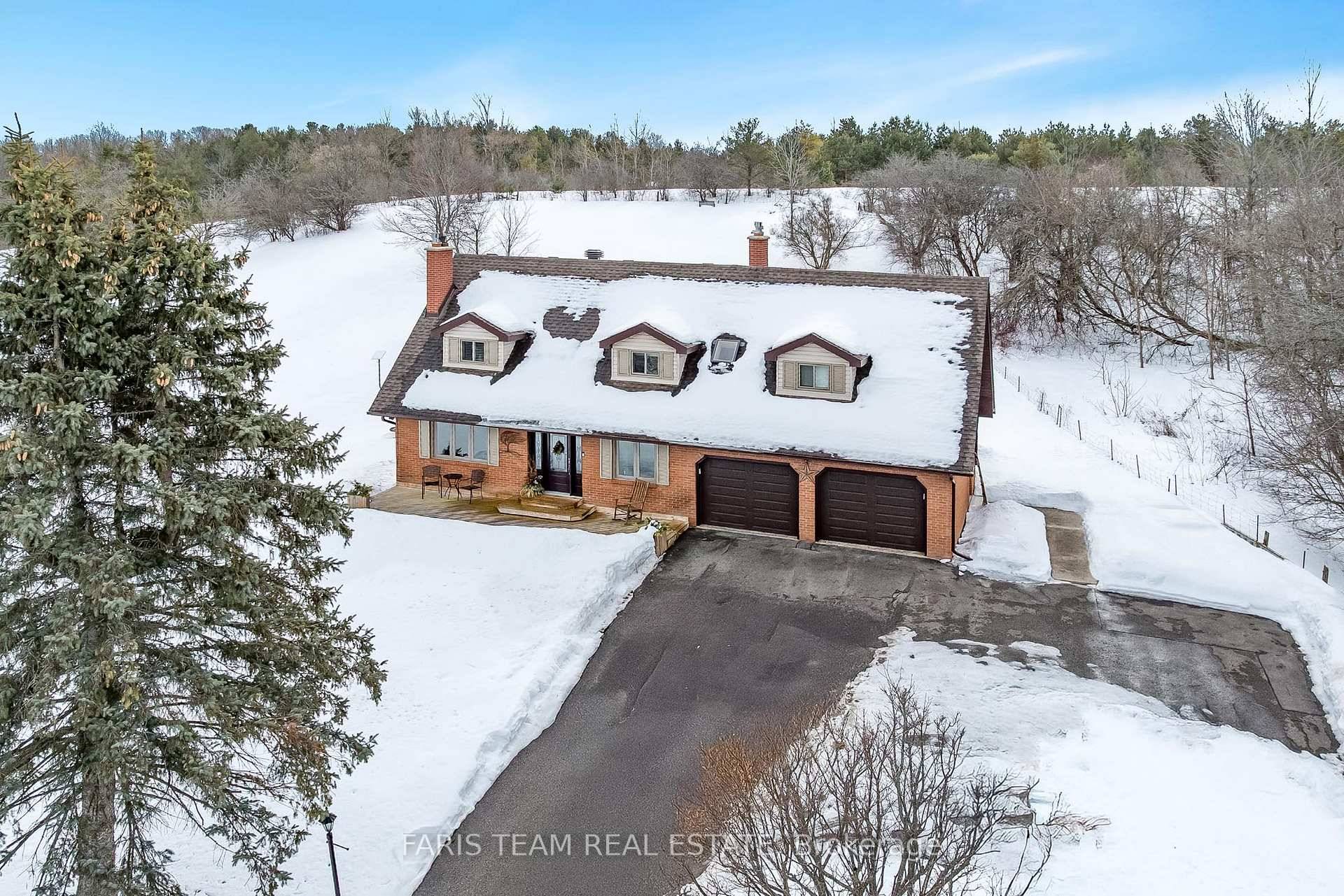 Top 5 Reasons You Will Love This Home 1 Follow the charming circular driveway to discover this secluded three bedroom home, offering a serene retreat surrounded by nature's beauty, settled ...