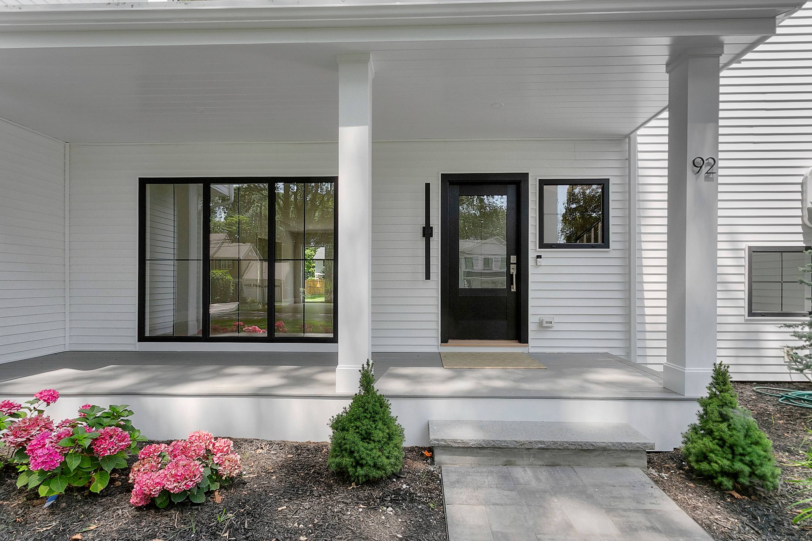 Gorgeous new construction on a private cul de sac backing up to Brooklawn Country Club.