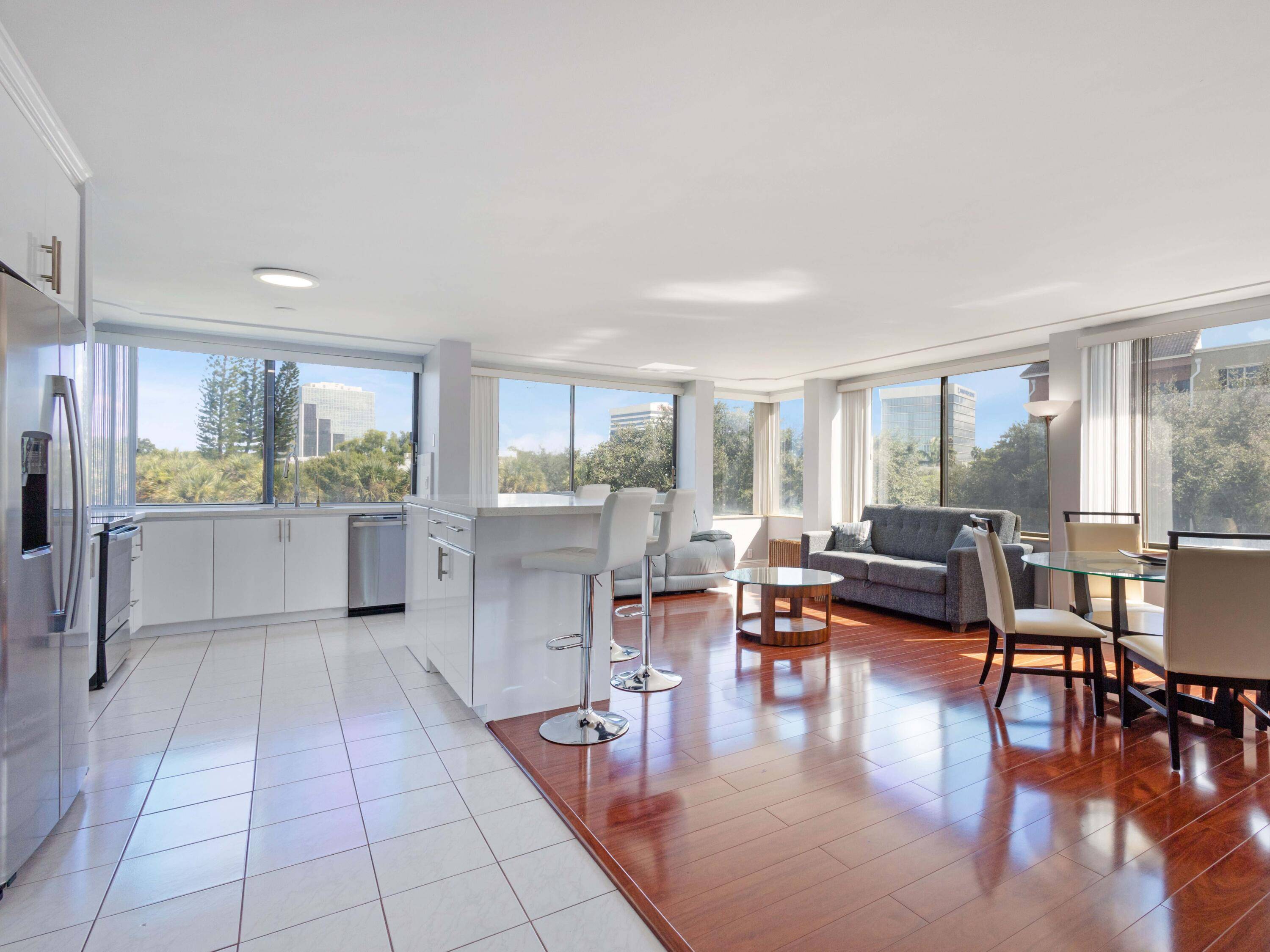 Step into this light filled third floor corner condo, where natural light and an inviting atmosphere instantly make you feel at home.