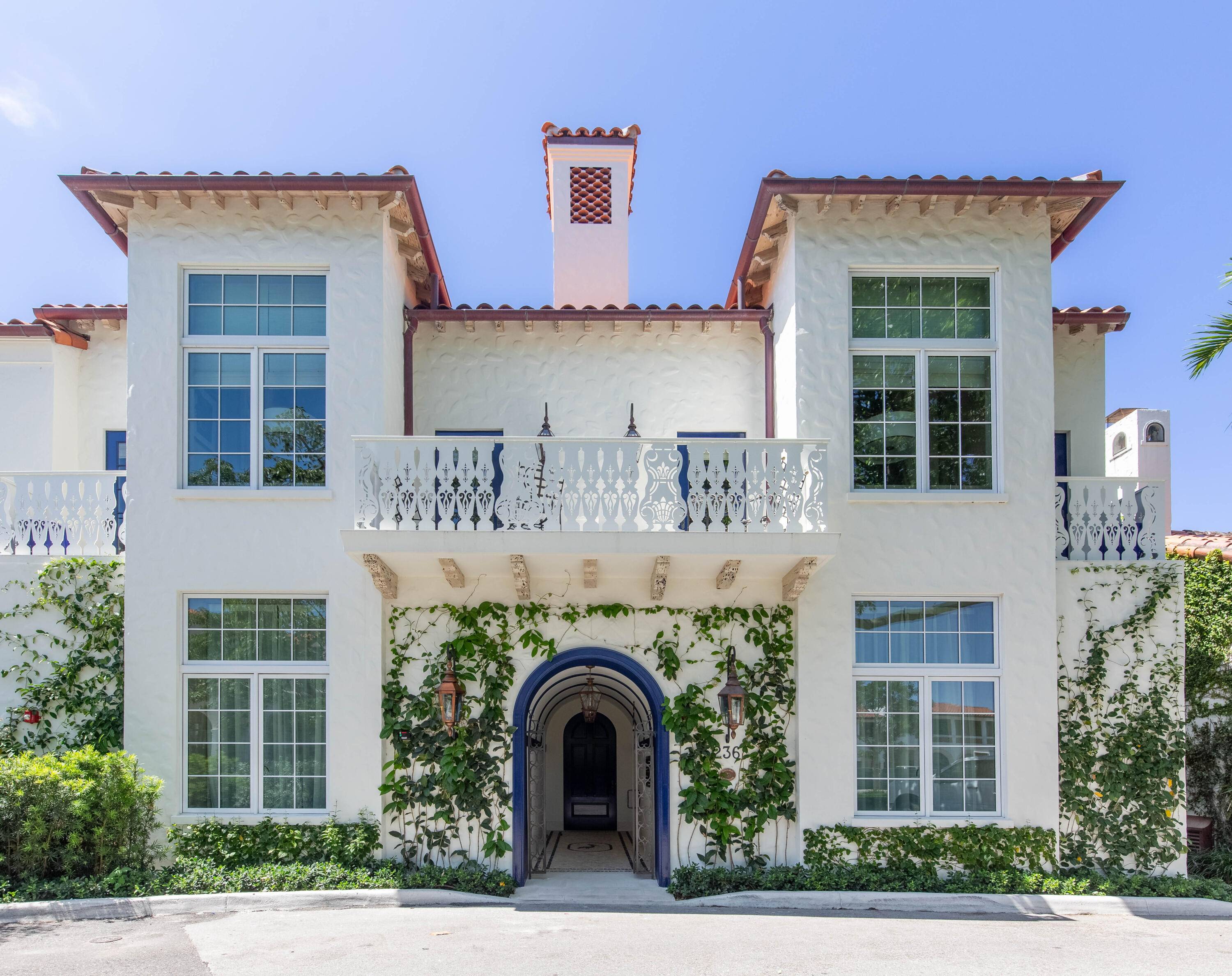 Discover timeless luxury in this rare landmarked jewel tucked within Palm Beach's exclusive Phipps Plaza.