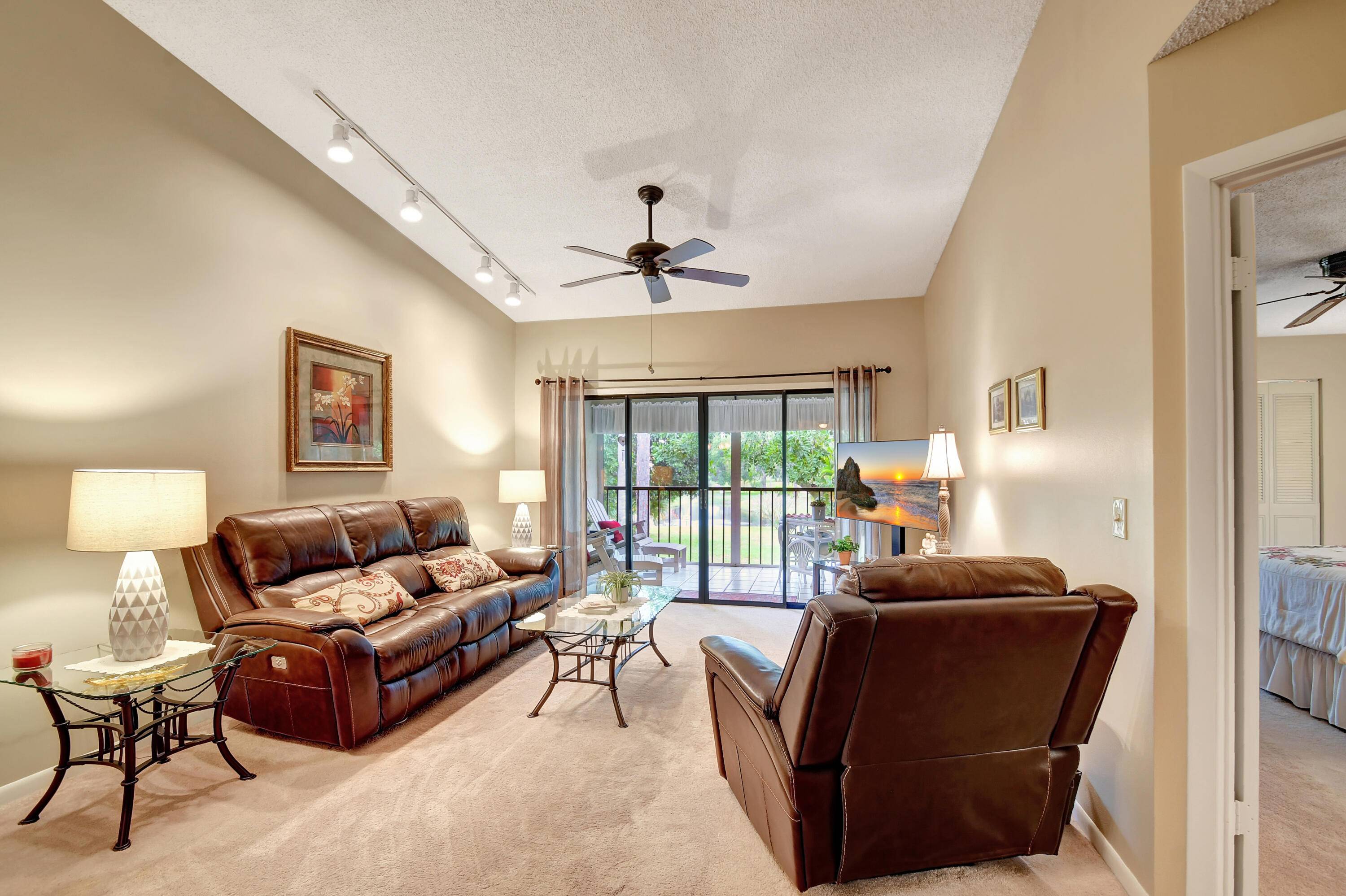 Don't miss out on this beautifully maintained unit with 2 2, vaulted ceilings and serene lake landscape view from the screened balcony w sliding doors to living dining room master ...