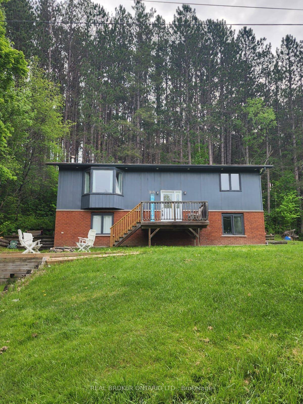 Perched perfectly across from the Magnetawan River with it's expansive 175 km's this updated raised bungalow is turn key ready and boastsalmost 2000 square feet of living space.