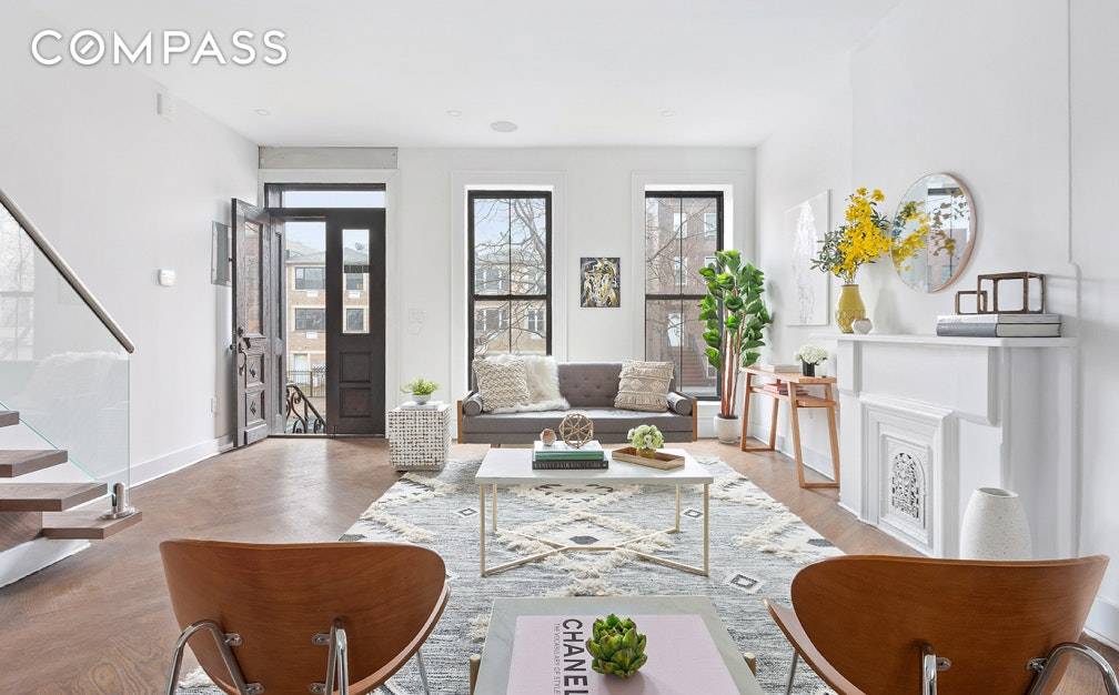 Originally constructed in 1910, this newly renovated two family home offers an abundance of space with a flexible and functional layout.